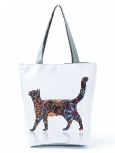 Sac cabas blanc avec imprime chat floral colore, sac a main pratique pour tous les jours.