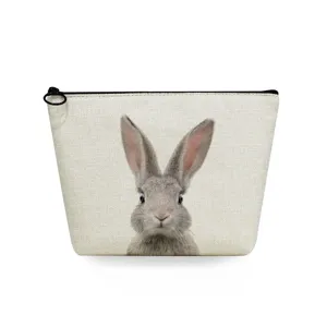 Portable linen cosmetic pouch featuring a realistic grey rabbit print, perfect for travel and daily use.