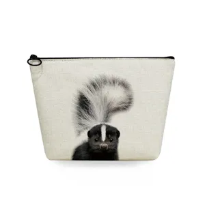 Canvas toiletry bag with cute skunk animal print, portable makeup pouch with secure black zipper.