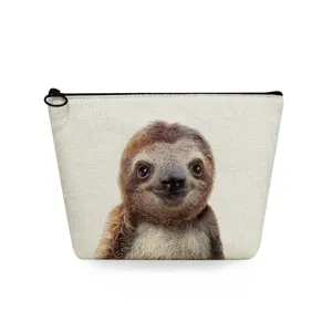 Close-up detail of the cute sloth print on this portable canvas makeup pouch zipper bag.