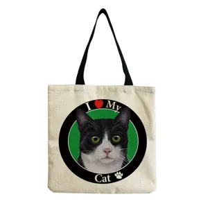 Canvas tote bag with cute black and white cat print, casual shoulder bag for daily use.