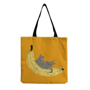 Cute cat banana print canvas shoulder bag, casual fashion casual tote handbag for daily use.