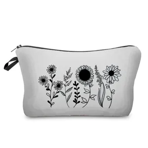 Nahaufnahme der weißen Kosmetiktasche mit schwarzem Linienkunst Blumen-Design und Reißverschluss.