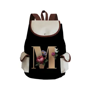 Stylish canvas backpack featuring a decorative floral letter M print and contrast design.