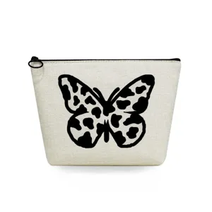 Canvas makeup pouch with black butterfly print, portable travel cosmetic storage bag for women.