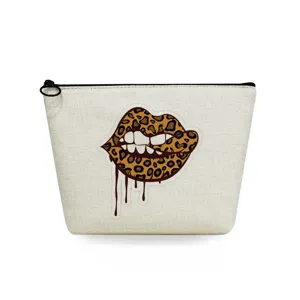 Detailed view of portable canvas cosmetic bag with stylish leopard print biting lips graphic.