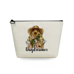 Canvas cosmetic bag with fashionable sunflower woman illustration and stylish letter print detail.