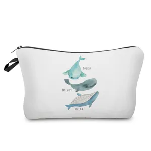 Close-up detail view of the cute whale printed canvas cosmetic bag with black zipper and strap.