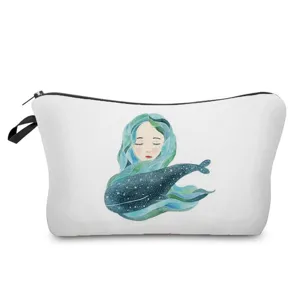 Detailed view of white cosmetic bag with watercolor whale girl print for travel use.