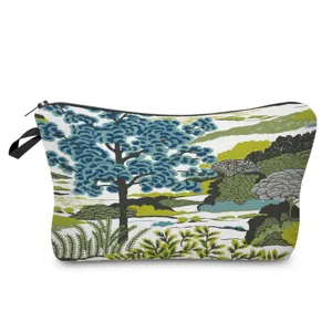 Scenic print makeup bag detail showing artistic landscape pattern and smooth zipper closure.