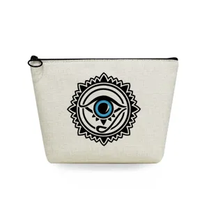 Detalle de la bolsa cosmetica de lona con un estampado grafico de ojo mistico en color negro y azul vivo.
