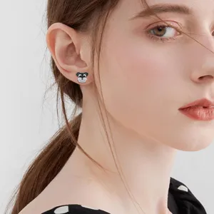 Exquisitos pendientes de tuerca de cachorro lindo para mujeres, detalle de joyas.