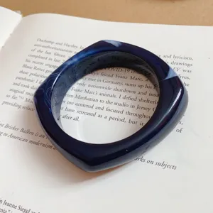 Dark blue acrylic geometric square bangle bracelet, chic resin jewelry detail view.