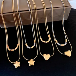 Collier pendentif double couche géométrique cœur étoile minimaliste en acier inoxydable.