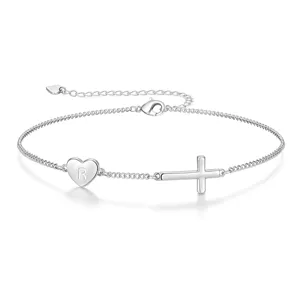 Silver bracelet featuring a heart charm with letter R and a cross pendant adjustable length