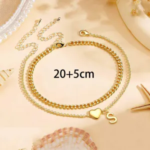 Double layer gold plated letter S heart anklet detail, perfect for summer beach vacation.