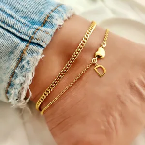 Gold double layer anklet with heart and letter charm for summer beach vacation style.