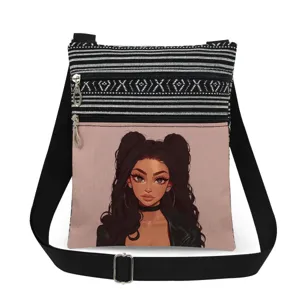 Close-up detail of casual canvas cross-body bag with stylish girl print and double zippers.