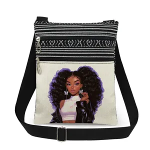 Detail view of the cute black girl printed canvas crossbody bag with double zippers and stylish straps.