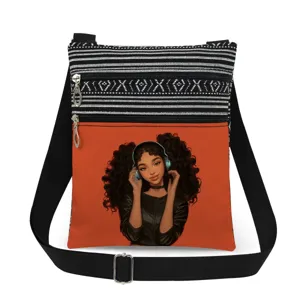 Detailed view of the stylish crossbody bag featuring a cute black girl graphic and double zippers.