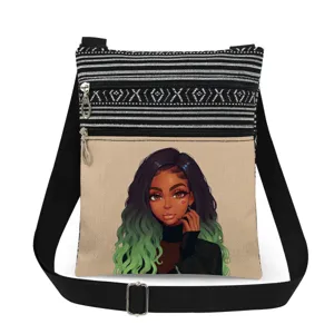 Detail view of stylish black girl print canvas crossbody bag with dual zippers and strap.