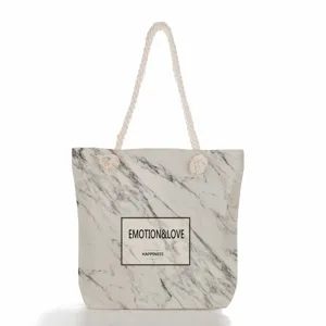 Grand sac cabas en toile avec impression marbre et poignées en corde épaisse pour femmes.