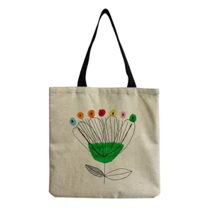 Borsa shopper in tela di lino con stampa floreale, ideale per la spesa quotidiana.