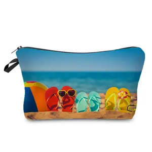 Trousse de maquillage portable imprimé plage avec fermeture éclair pour rangement de voyage.