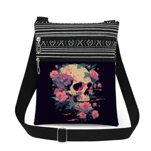 Close-up detail of the gothic skull and rose print with practical double zipper pockets.