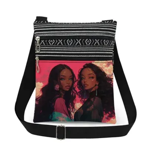 Close-up detail of the canvas crossbody bag featuring double zippers and black girl art print.