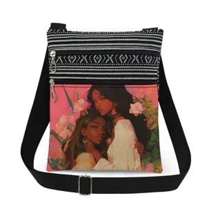 Detailed view of the stylish canvas crossbody bag showing print and dual zipper details.