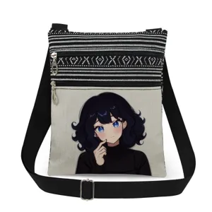 Canvas crossbody bag featuring a cute cartoon anime girl print, double zippers and adjustable strap.