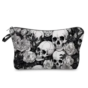 Close-up detail of the gothic skull and rose print cosmetic bag with zipper closure.