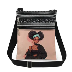 Close-up detail of the canvas shoulder bag featuring a chic cartoon girl print and double zippers.