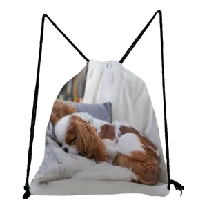 Detailed view of lightweight drawstring backpack featuring cute Cavalier King Charles Spaniel print.