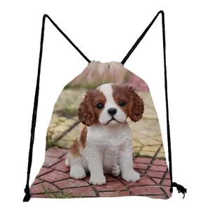 Detailed view of the lightweight drawstring backpack featuring cute Cavalier King Charles Spaniel print.