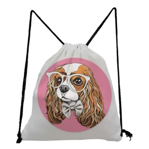 Detailed view of the cute Cavalier King Charles Spaniel print on a white drawstring backpack.
