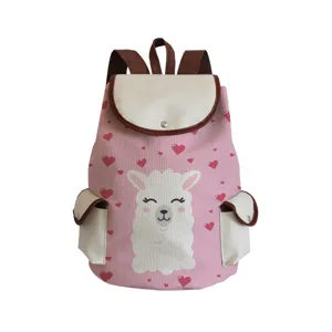 Pink canvas backpack with cute cartoon alpaca print, brown straps and front pockets for use.