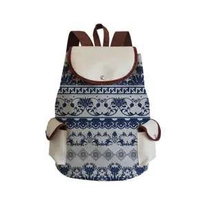 Classic blue and white porcelain print canvas backpack with brown trim for daily travel use.