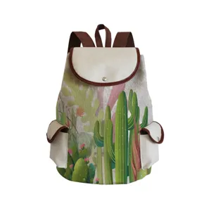 Closeup view of the canvas backpack featuring a vibrant cactus botanical print and front pockets.