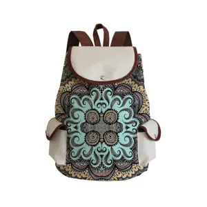 Detailed view of the stylish floral mandala canvas backpack with brown trim and multiple pockets.
