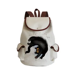 Détail de sac à dos en toile imprimé chat noir mignon, sac de voyage école décontracté marron.