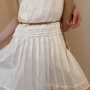 Detailed view of the ethnic wax cord and wooden bead braided waist chain belt for women.