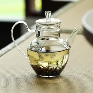 Théière en verre transparent avec motif de pin et de grue, théière kung fu résistante à la chaleur.