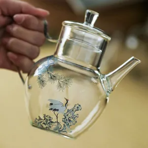 Theiere en verre avec motif de pin et de grue, infuseur de the kung fu chinois traditionnel.