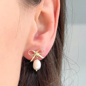 Elegant gold bow earrings with dangling pearl, chic jewelry gift for women and bridesmaid.