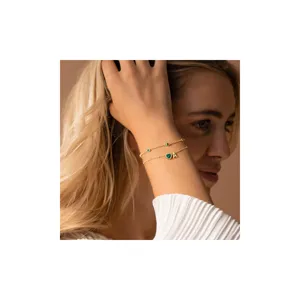 Gold initial heart bracelet with green zircon, fashion dainty letter jewelry for women.