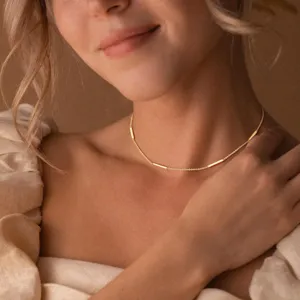 Minimalist gold-toned copper choker necklace with chic bar links for women, stylish everyday.
