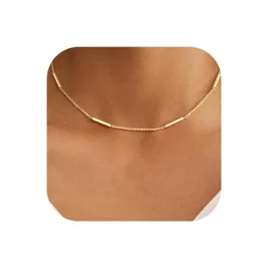 Gold layered clavicle chain necklace for women, minimalist fashion design jewelry for daily wear.