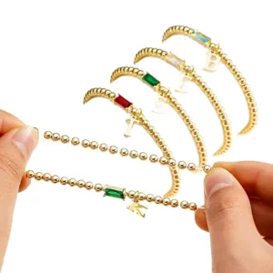 Gold beaded initial birthstone bracelet for women, stretch custom letter charm jewelry
